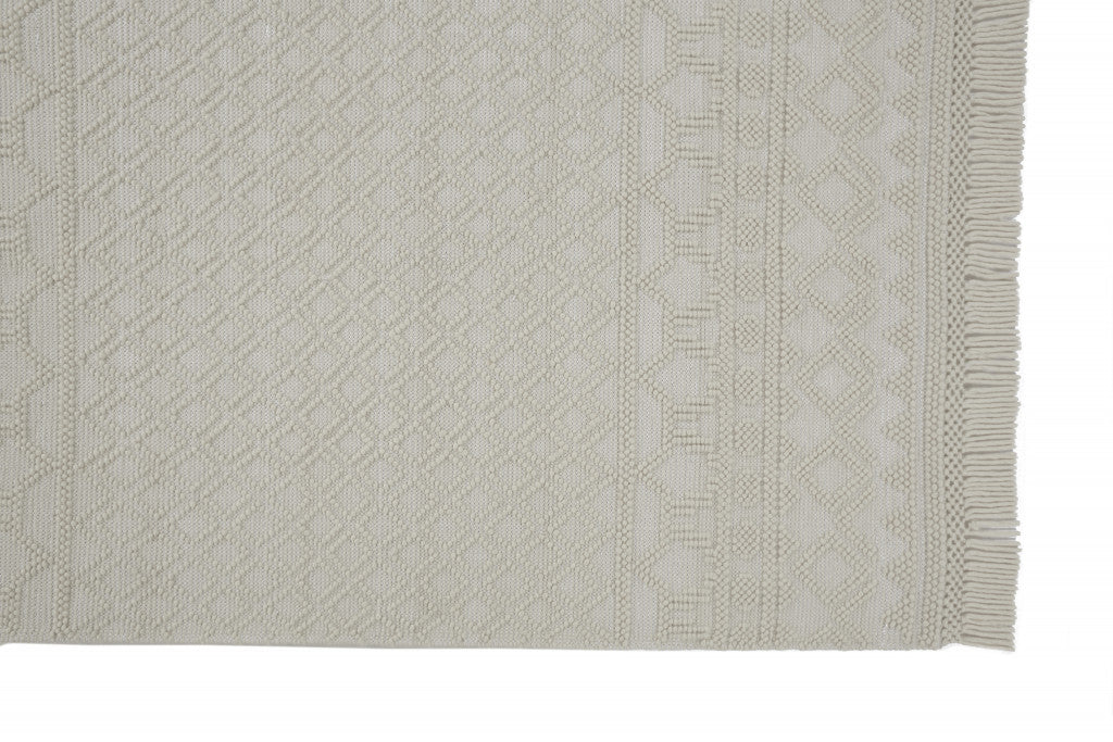 5' X 8' Ivory Wool Geometric Hand Woven Area Rug With Fringe