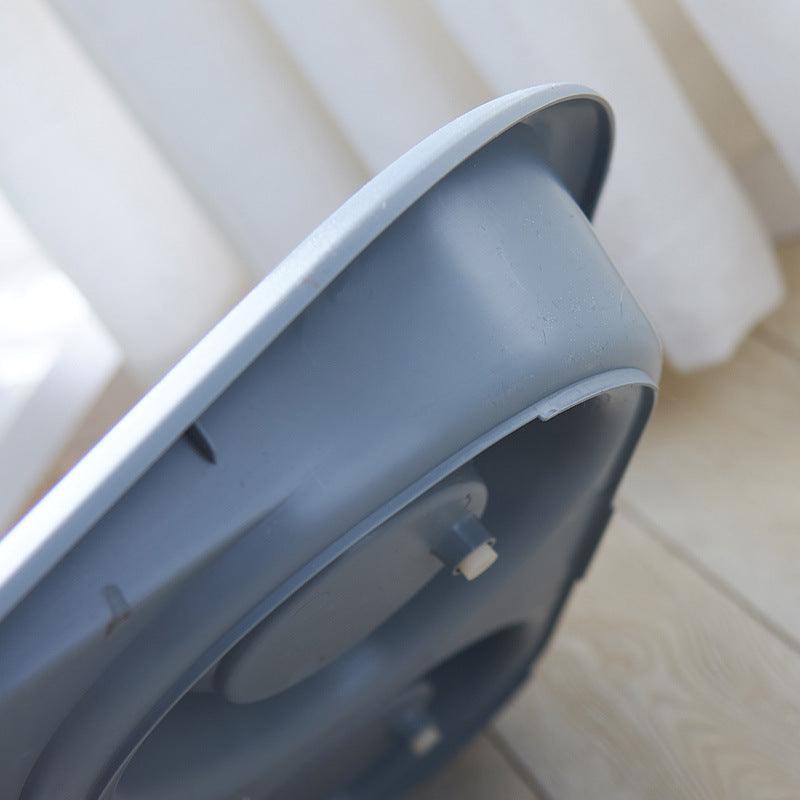 Close-up of a gray dual-purpose pet feeding station designed for easy pet meal access