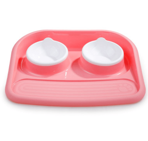 Pink dual-purpose pet feeding station with two removable bowls for convenient feeding