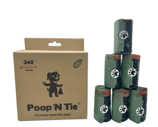 Poop'N Tie biodegradable dog waste bags in a box with six rolls for eco-friendly pet owners